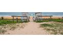 Path to Ormond Beach Plaza with an ocean view. A picturesque beach access point in a scenic location at 25 Dolphin Ave, Ormond Beach, FL 32176