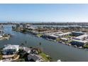 Aerial view of the community features waterfront views, boat docks, and proximity to beaches at 315 N Causeway # 2060, New Smyrna Beach, FL 32169