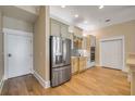 Well-equipped kitchen featuring stainless steel appliances and modern cabinets at 423 S Atlantic Ave # 301, New Smyrna Beach, FL 32169