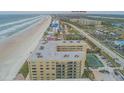 Aerial view of a condominium near the beach and Ponce Inlet Lighthouse at 4575 S Atlantic Ave # 6203, Ponce Inlet, FL 32127