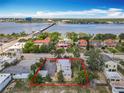 Charming home that features mature trees, large parking area and city proximity at 20 N Halifax Ave, Daytona Beach, FL 32118