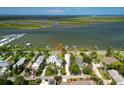 Aerial view of waterfront neighborhood, showcasing water views and proximity to the intercoastal waterway at 206 S Riverside Dr, Edgewater, FL 32132