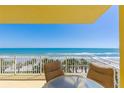 A charming condo balcony featuring stunning ocean views, perfect for relaxation and coastal living at 2300 N Atlantic Ave # 203, Daytona Beach, FL 32118