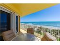 Enjoy breathtaking ocean views from this inviting condo balcony, perfect for outdoor lounging at 2300 N Atlantic Ave # 203, Daytona Beach, FL 32118