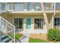 Ground floor condo exterior with patio, sliding glass doors, and easy access to outdoor space at 335 N Causeway # E3, New Smyrna Beach, FL 32169