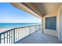 Relax on this beachfront balcony offering stunning ocean views and direct access to the sandy shore at 4575 S Atlantic Ave # 6607, Ponce Inlet, FL 32127