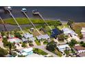 Well-maintained waterfront homes with lush lawns, private docks and access to the open water at 8 Richmond Dr, New Smyrna Beach, FL 32169