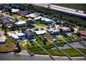 Coastal homes feature manicured lawns, private pools, and docks, set in a charming waterfront community at 8 Richmond Dr, New Smyrna Beach, FL 32169