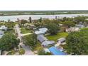 Stunning aerial view of the neighborhood highlighting the property's proximity to the water at 132 E Turgot Ave, Edgewater, FL 32132