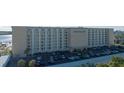 Exterior of Admiralty Club featuring parking and a view of the Intracoastal waterway and bridge at 3606 S Peninsula Dr # 406, Port Orange, FL 32127