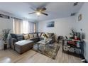 Inviting living room with ample seating, modern decor, and plenty of natural light at 5476 W Bayshore Dr, Port Orange, FL 32127