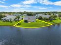 Lakeside home with a spacious backyard, perfect for outdoor activities and relaxation at 684 Rochester Ct, New Smyrna Beach, FL 32168