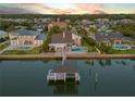 Gorgeous waterfront houses on a scenic canal, each with a private pool and boat dock at 1219 Commodore Dr, New Smyrna Beach, FL 32168
