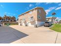 Spacious parking area with individual garages enhancing the appeal of this Sand Dunes complex near the beach at 2898 Ocean Shore Blvd # 5020, Ormond Beach, FL 32176