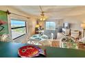 Living room with ocean view from the kitchen island at 30 Inlet Harbor Rd # 606, Ponce Inlet, FL 32127