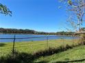 Scenic view of a peaceful lake, with lush greenery at 910 Lake Ave, Edgewater, FL 32132