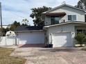 Two car attached garage and a detached shed at 3115 Albert St, Orlando, FL 32806