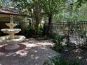 Relaxing courtyard with fountain and brick pavement at 829 Camargo Way # 212, Altamonte Springs, FL 32714