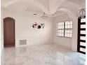 Bright and spacious entryway with marble floors and high ceilings at 32702 View Haven Ln, Sorrento, FL 32776