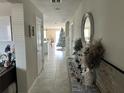 Bright and spacious entryway with view to the living room at 4499 Magnolia Ridge Ct, Kissimmee, FL 34746