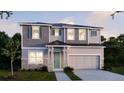 Two-story house featuring gray siding, stone accents, and a light green door at 1676 Andover Ridge Dr, Deland, FL 32720