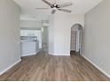 Bright living room with hardwood floors and an open floor plan at 13620 Waterhouse Way, Orlando, FL 32828