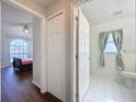Clean bathroom with a toilet, shower, and white vanity at 3507 Tenby Cir, Clermont, FL 34711