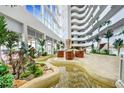 Bright lobby area with a unique water feature and plenty of seating at 2545 S Atlantic Ave # 2107-2108, Daytona Beach Shores, FL 32118