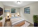 Cozy bedroom with neutral walls and plenty of natural light at 1111 28Th Nw St, Winter Haven, FL 33881