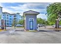 A gated entrance with stone pillars provides security and an upscale feel at 3176 Feltrim Pl # 305, Kissimmee, FL 34747