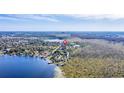 Aerial view showing home location near lake and conservation at 10424 Pocket Ln, Orlando, FL 32836