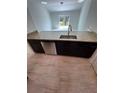 Modern kitchen showcasing granite countertops, stainless steel appliances, and a stylish sink with a designer faucet at 1780 Converse Ct, Deltona, FL 32738