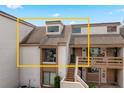 Condo exterior showcasing a two-story building with a unique roofline at 206 Orienta Point St # 206, Altamonte Springs, FL 32701