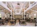 Spacious event barn features rustic decor, high ceilings, and ample seating for large gatherings and celebrations at 4600 Nebraska Ave, Sanford, FL 32771