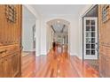 Grand entry with hardwood floors and elegant double doors at 222 Acadia Ter, Celebration, FL 34747