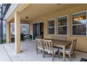 Comfortable outdoor seating area with grill, perfect for entertaining and enjoying outdoor living at 6047 Broad Oak Dr, Davenport, FL 33837