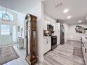 Open floor plan showcasing the entry, kitchen with stainless steel appliances, and a spacious layout at 4316 Natchez Trace Dr, St Cloud, FL 34769