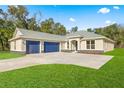 New construction home with three-car garage at 13455 Sw 85 Pl, Dunnellon, FL 34432