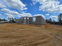 Under construction block foundation sitting on a dirt lot with blue skies above at 13455 Sw 85 Pl, Dunnellon, FL 34432