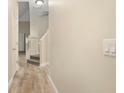 Bright hallway with tile floors and staircase at 2472 Temple Grove Ln, Kissimmee, FL 34741