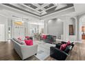 Spacious living room with hardwood floors and coffered ceiling at 2526 Nobleman Ct, Windermere, FL 34786