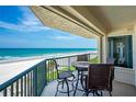 Ocean view balcony with patio furniture at 4631 S Atlantic Ave # 8301, Ponce Inlet, FL 32127