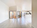 Bright and airy living room with tile floors and sliding glass doors at 2906 Woodruff Dr, Orlando, FL 32837