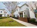 Modern two-story home with gray siding and a landscaped yard at 790 Candlebrush Ln, Lake Mary, FL 32746