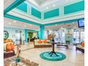 Bright and inviting lobby with comfortable seating at 113 Rogues Retreat, Davenport, FL 33897