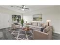 Bright living room featuring modern furniture and neutral colors at 610 Walker St, Holly Hill, FL 32117