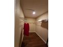 Walk-in closet with rod and wire shelf for organized storage at 1611 Sand Key Cir, Oviedo, FL 32765