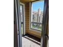 Balcony with a view of the building and shared green space at 4401 Thornbriar Ln # 202, Orlando, FL 32822