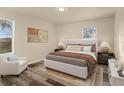 Spacious bedroom with a king-size bed, plush carpet, and ample natural light at 912 W 5Th St, Lakeland, FL 33805