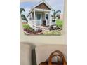 Tiny house exterior, landscaped with brick border at 575 2Nd St, Oviedo, FL 32765